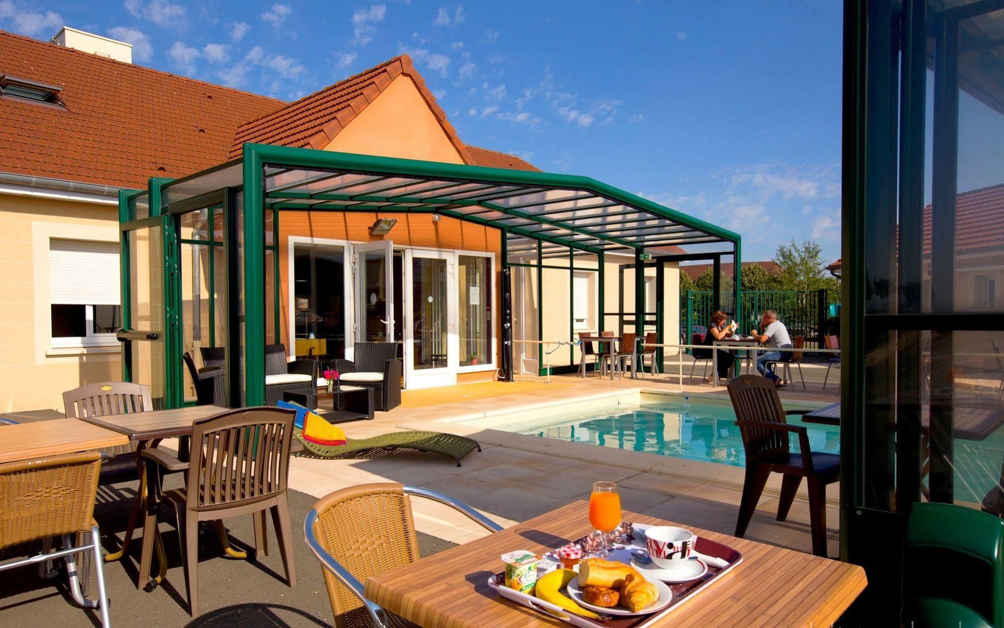 Logis Jum'Hotel Saints-Geosmes Εξωτερικό φωτογραφία